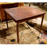 Danish mid-century modern teak draw leaf table, having a square top over the tapering cylindrical