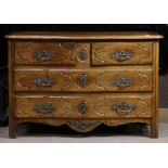 French Provincial chest of drawers 18th century, having a serpentine top above the conforming case