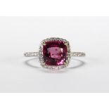 Spinel, diamond and 14k white gold ring Centering (1) cushion-cut spinel, weighing approximately 2.