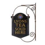 Enamel metal retailers sign reading "Lyons Tea Sold Here" with a crest surmounting lettering, and