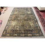 Semi antique Indo Amritsar carpet depicting trees, flowers, and birds, 9'8" x 16'9"