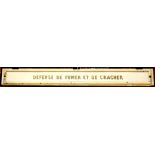 French metal enamel Metro sign, 1950-1970, reading "Defense de fumer et de cracher", executed in