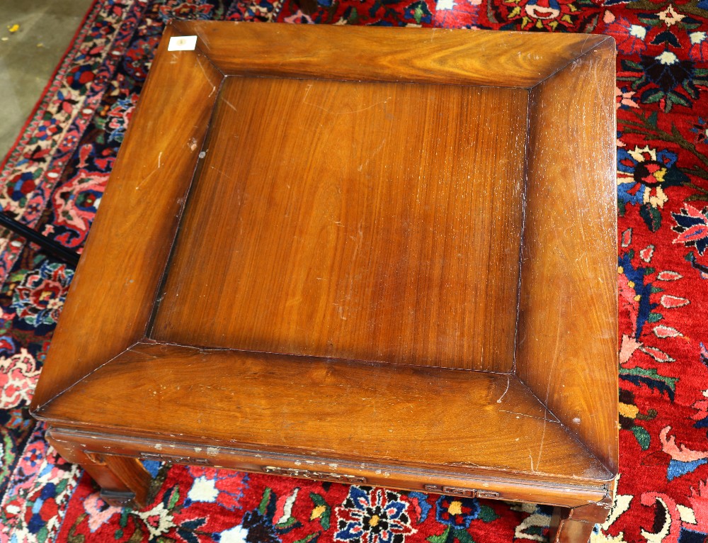 Chinese square low table, with a square floating panel, above an apron carved with scrolls in - Image 2 of 3