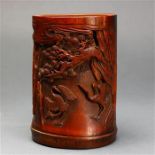 Chinese bamboo brush pot, carved and pierced with a pair of cranes below a gnarled pine tree,