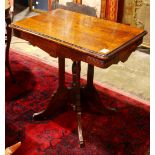 Victorian Eastlake occasional table, having a rectangular top, above a quadruped base, 29"h x 30"w x