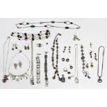 Collection of multi-stone, sterling silver, and metal jewelry Including 1) Luli green glass,