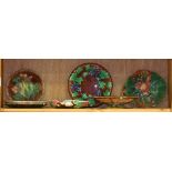(lot of 7) One shelf of majolica ceramic table articles, consisting of plates and a tazza, each