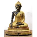 Thai gilt bronze Buddha, draped in monastic robe with floral roundels, in bhumisparsha and dhyana