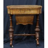 Victorian games and sewing table, having an inlaid floral decorated top opening to the playing