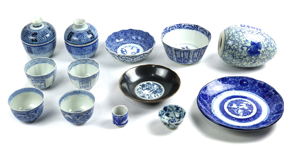(lot of 13) Japanese blue-and-white ceramics: three bowls; two sake cups; one transfer dish; four