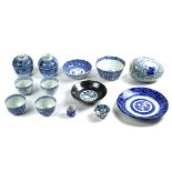 (lot of 13) Japanese blue-and-white ceramics: three bowls; two sake cups; one transfer dish; four