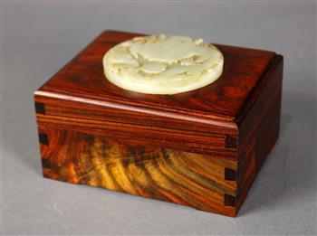 Chinese rectangular wood box, the lid inset with a hardstone plaque carved with a dragon pursuing