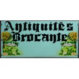 French antique shop sign, circa 1900-1930, inscribed "Antiquites Brocante", on a sage ground, 14.5"h