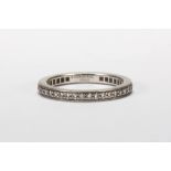 Tiffany & Co. diamond and platinum eternity band Featuring (40) full-cut diamonds, weighing a