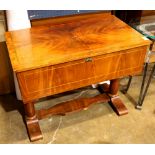 Biedermeier work table, having a rectangular top with an inlaid border, the hinged lid opening to