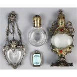 (lot of 4) Assorted silver and metal mounted glass perfume bottles, the first, a sterling silver