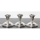 (lot of 3) Hamilton sterling silver weighted candlesticks, each with the single bobeche having a