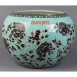 Chinese porcelain jardiniere, the compressed body with bushes of peonies in grisaille on a turquoise