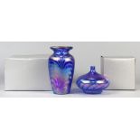 (lot of 2) Art glass vases, each having blue ground with a pulled iridescent motif, one having a
