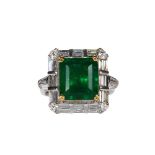 Emerald, diamond and 18k white gold ring Featuring (1) emerald-cut emerald, weighing 7.43 cts.,