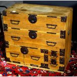 Japanese tansu chest, two long drawers above another drawer to the left and and two smaller