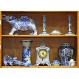 (lot of 9) Delftware and Delft style pottery group, comprising a pair of candle holders, having a