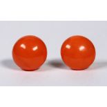 Pair of coral and yellow gold button earrings Featuring (2) coral buttons, measuring approximately
