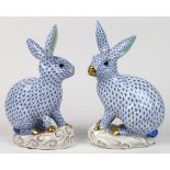 (lot of 2) Herend hand painted porcelain rabbits, each decorated in light blue in the Fish Net