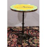 French bistro table, having a enamel decorated circular top inscribed "Cafe Society, Where Art Meets