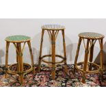 (lot of 3) French bistro rattan bar stools, each having a circular seat, one having a black and