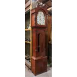 American tall case clock, 19th century, having a broken pediment top, above a Roman numeral dial,