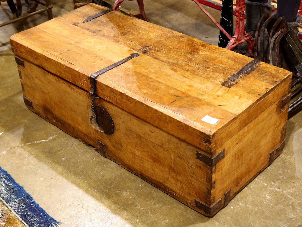 Continetal blanket chest, having a hinged top above an open interior, 15"h x 42"w x 18.5"d;