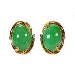 Pair of jadeite, diamond and 14k yellow gold earrings Featuring (2) oval jadeite cabochons,