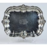 International sterling silver serving tray, the scallop rim framing the rectangular plateau with