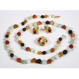 Multi-colored jade and yellow gold jewelry Including 1) multi-colored 10 mm jade bead and 14k yellow