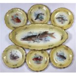 (lot of 7) French Limoges porcelain fish service, depicting an eel and karp if fine detail,