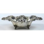 Reed and Barton sterling silver candy dish in the "Francis I" pattern, having a scallop ruffle rim