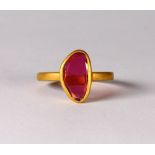 Tourmaline and 18k yellow gold ring Featuring (1) free-form tourmaline, measuring approximately 12.2