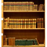 Three shelves of leather bound books, mostly relating to literature, including British Poets,