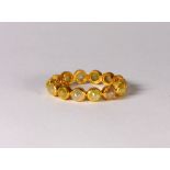 Diamond and 18k yellow gold eternity ring Featuring (14) rose-cut diamonds, measuring