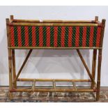 French bistro rattan jardiniere, having a rectangular form planter, with a caned exterior,