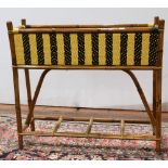French bistro rattan jardiniere, having a rectangular form planter, with a caned exterior,