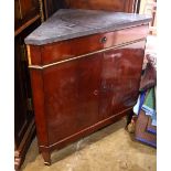 French Neoclassical style mahogany corner cabinet, having a marble top, above a single drawer and