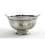 American sterling silver and glass bowl, by Wilcox and Wagoner, the reticulated bowl frame with a