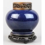Chinese cobalt blue glazed porcelain jar, with a compressed body raised on a low foot ring, with