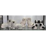 (lot of 6) Staffordshire style pottery figural group, consisting of (3) pairs of spaniels, two