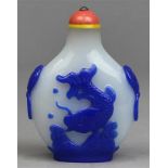 Chinese blue overlay white glass snuff bottle, 19th/early 20th century, both sides featuring a
