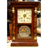 Regulator clock, late 19th/early 20th Century, the architectural wood case framing a two panel glass