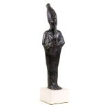 Egyptian style bronze sculpture of the God Osiris, depicted wrapped in a close fitting cloak,