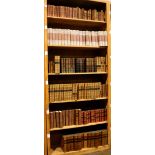 Six shelves of mostly leather bound books, relating to literature and history, including The Works